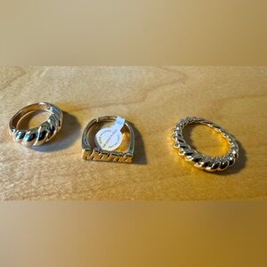 Set of three rings from Anthropologie. 14K gold plate, one with the word “mama.”